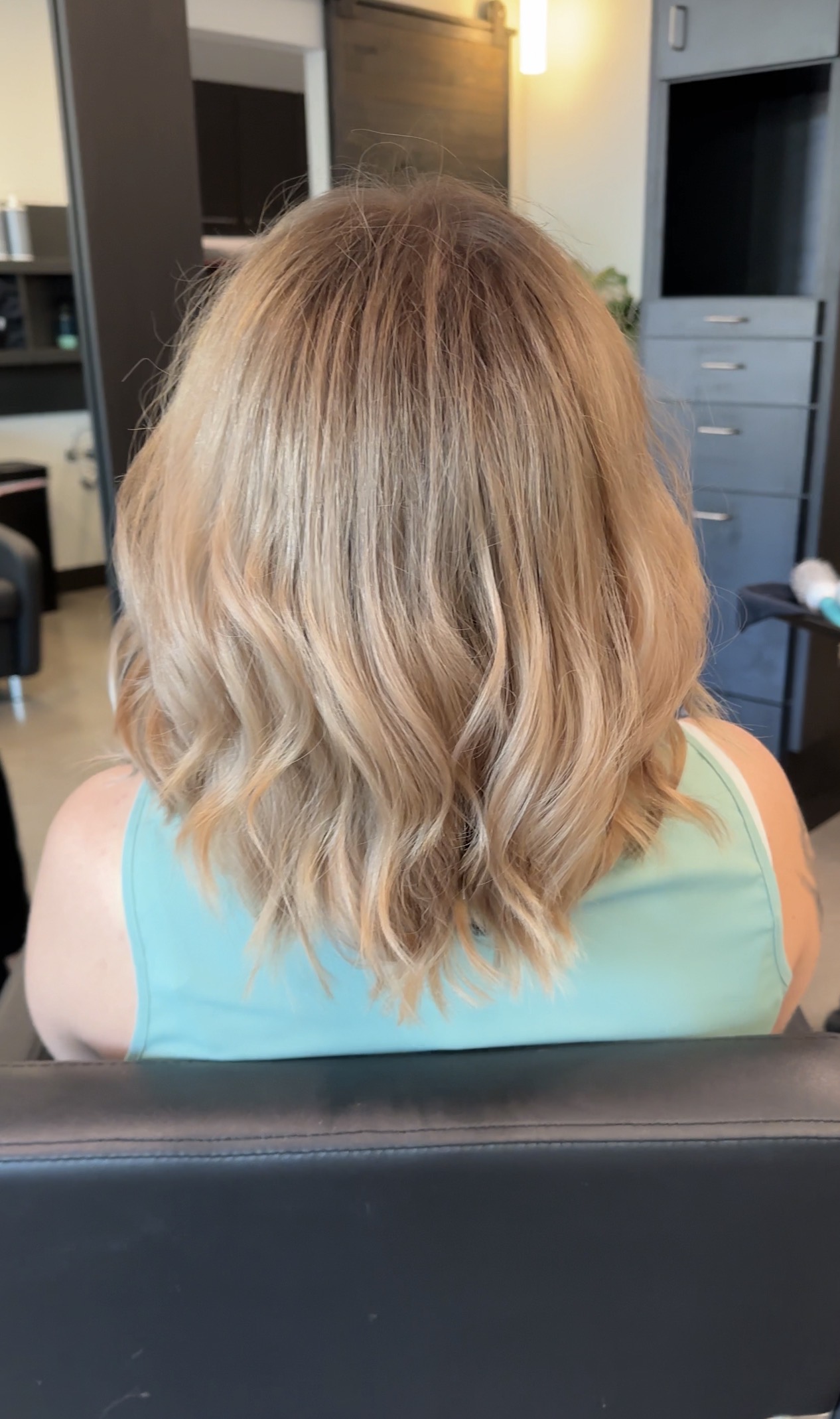 Aida Beauty short layers haircut and Balayage